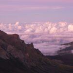 a view of the mountains and clouds from the top of a mountain β Maui United Way Launches Emergency Fund to Address Recent Flooding Impacts | Maui Tom's News