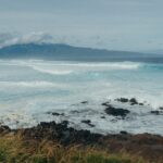 a view of a body of water with mountains in the background — High Surf Advisory Issued for South-Facing Shores Through Weekend | Maui Tom's News