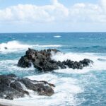 Waves crashing into lava rock formations along the coastline on the Road to Hana in Maui, Hawaii. — March Storm Damage Leaves Multiple Road Sinkholes Awaiting Costly Repairs | Maui Tom's News
