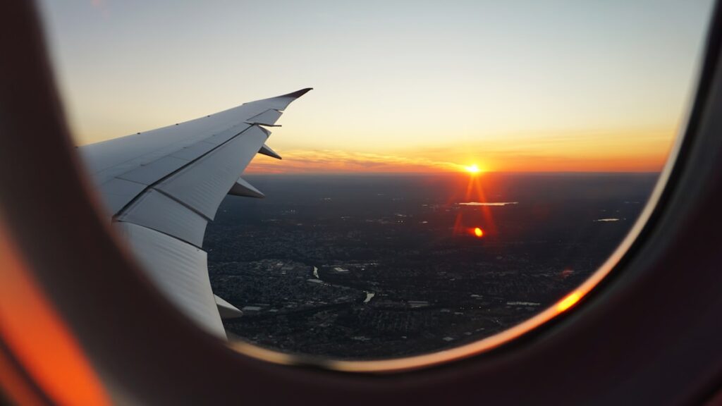 Airplane wing view sunset — New Electric Vehicle Fast-Charging Station Opens at Kapalua Airport | Maui Tom's News