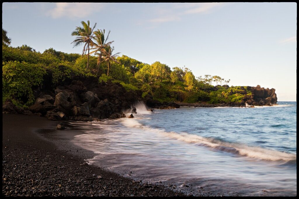The black sand beach in Wai'anapanapa State Park is really a black pebble beach, but it is pretty cool. The waves make a crackling sound when they go back. Here I played around with my new Fader II fi — Major Construction Closes Main Access to Waianapanapa Black Sand Beach | Maui Tom's News