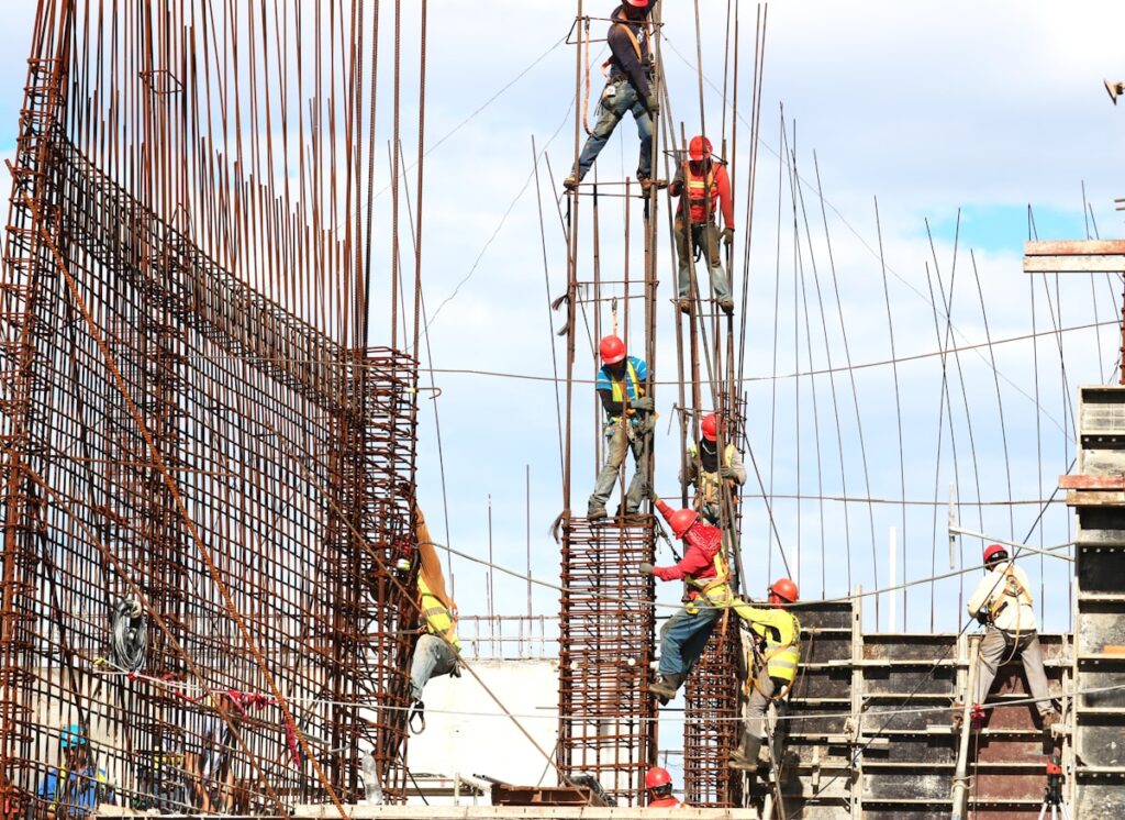 Workers on construction — Maui County Approves $1.6B Budget, Adds Security Funding After Threat | Maui Tom's News