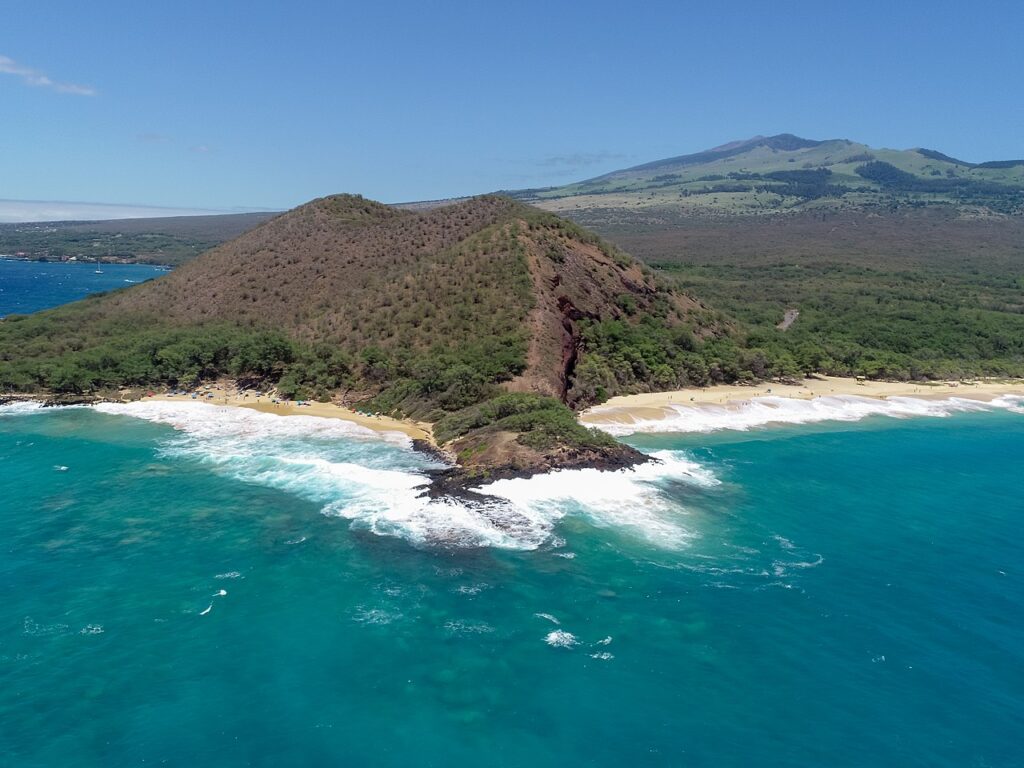 Aerial of Makena Beach and Puu Olai in Maui — Repeat Visitor Shares $13,320 Maui Vacation Breakdown, Cancels 2025 Trip | Maui Tom's News