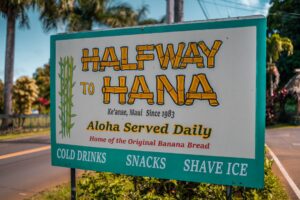 white and yellow signage during daytime — Tokuda Secures Extended Military Disaster Response for Hawaii Communities | Maui Tom's News