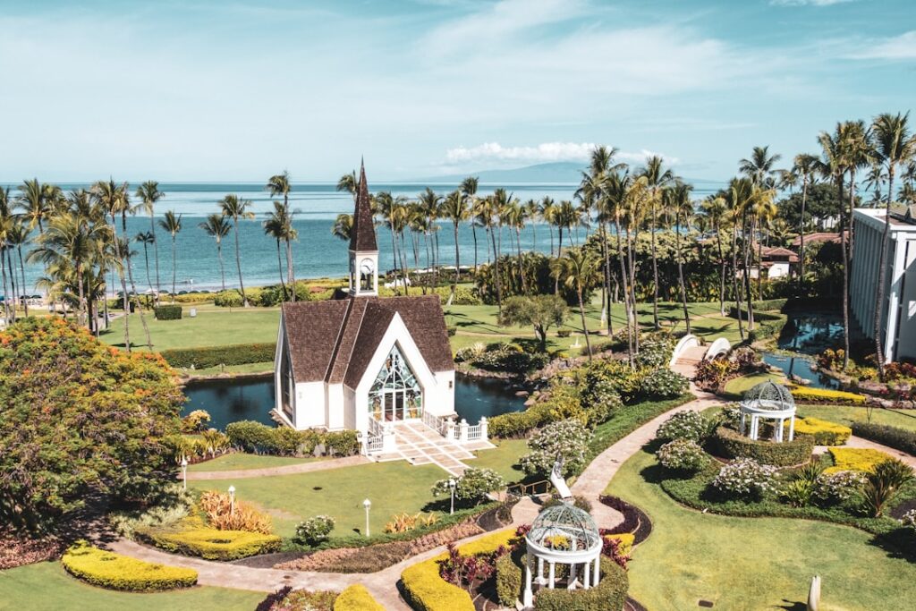 white and brown concrete house near green trees and body of water during daytime — Ali Wong Brings Stand-Up Shows to Maui Arts & Cultural Center July 30–31 | Maui Tom's News