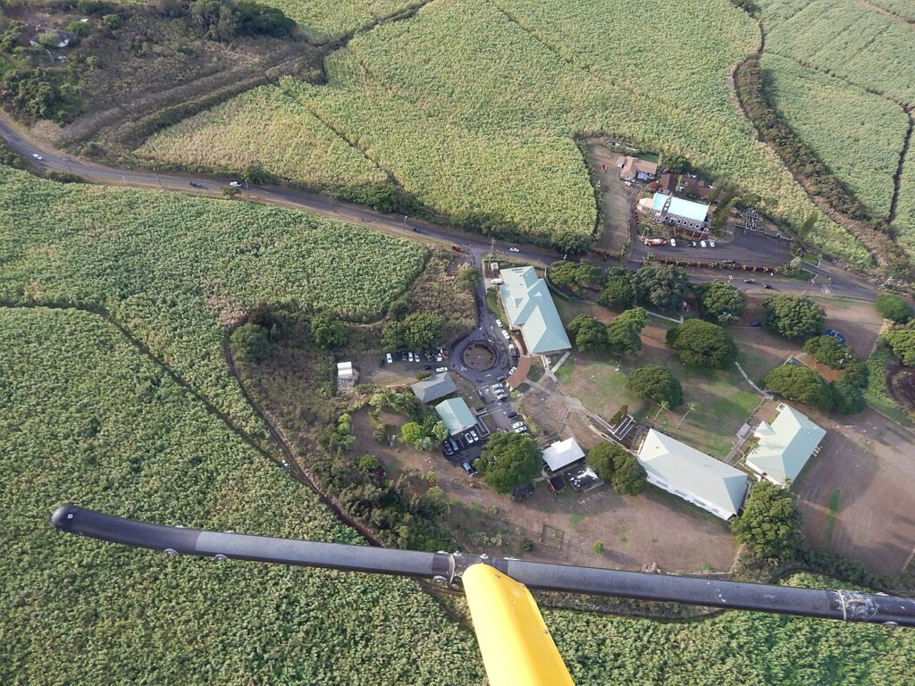 Saccharum officinarum (Ko, sugarcane) Aerial view Holy Rosary Church and Paia Elementary School at Paia, Maui, Hawaii. October 14, 2014 #141014-2154 Image Use Policy — HTA Awards Cultural Grants to Four Maui Nui Organizations | Maui Tom's News